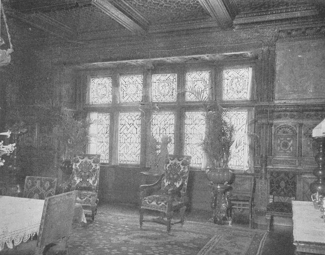 DINING-ROOM IN NEW YORK HOUSE SHOWING LEADED-GLASS
WINDOWS