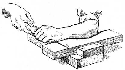 Fig. 66.&mdash;Chiselling away Wood up to Gauge Line.
