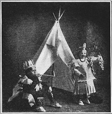 Fig. 169&mdash;Look at our newspaper Indian costumes. We are playing Indians.