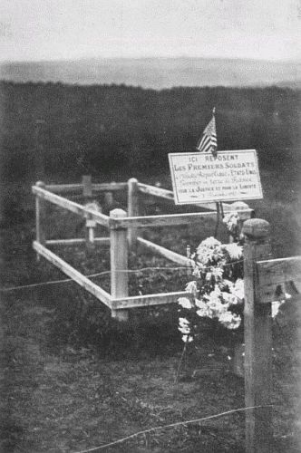 GRAVE OF FIRST AMERICAN KILLED IN FRANCE

Translation: Here Lie the First Soldiers of the Great Republic
of the United States of America, Fallen on French Soil for
Justice and for Liberty, November 3rd, 1917