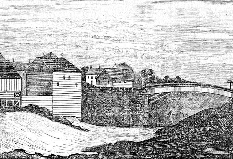 A
building along side a river