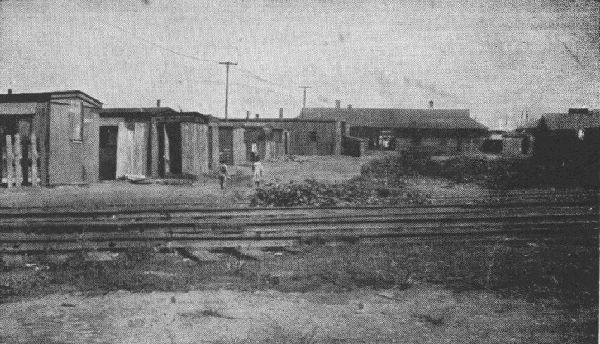 A RAILROAD CAMP FOR IMMIGRANT WORKERS IN A PROSPEROUS SUBURBAN
COMMUNITY, 1920